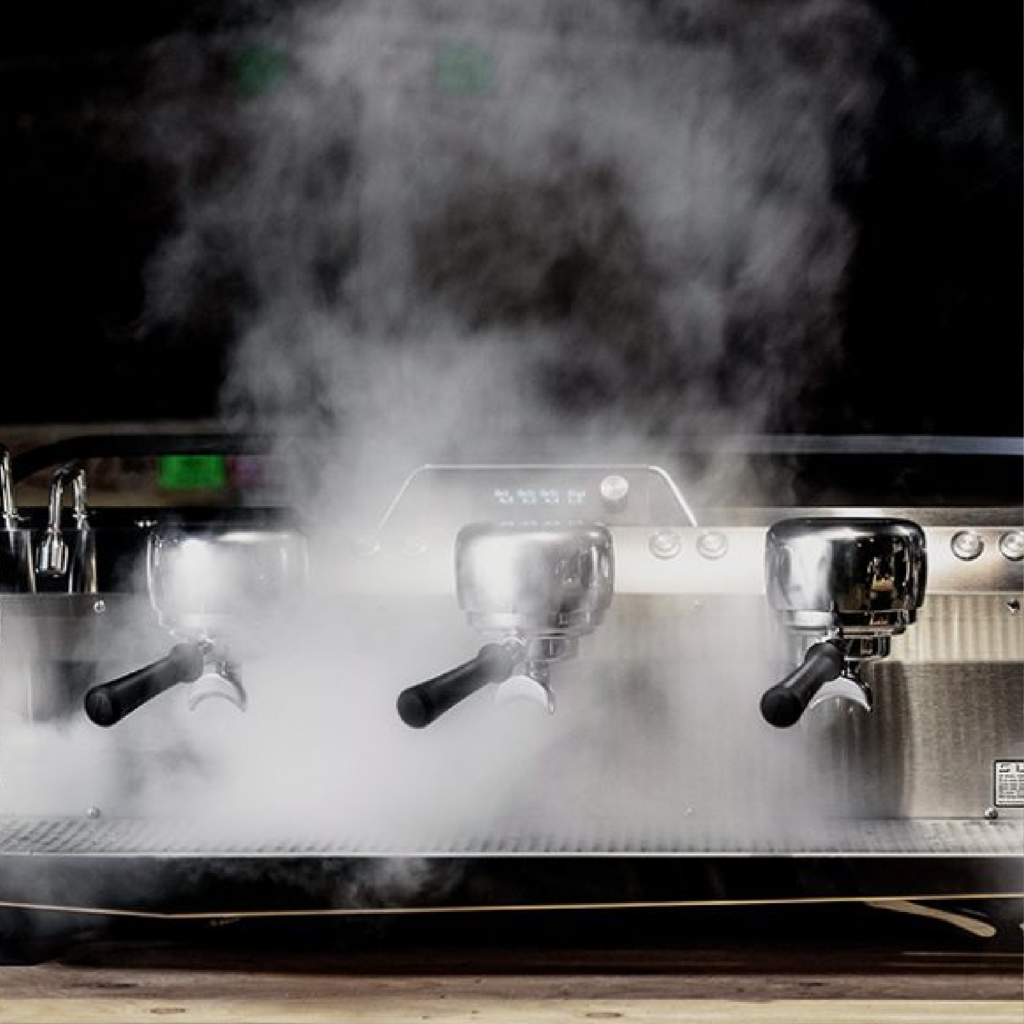 Slayer Steam LP Commercial Espresso Machine 3 grouphead. Front view of the machine.