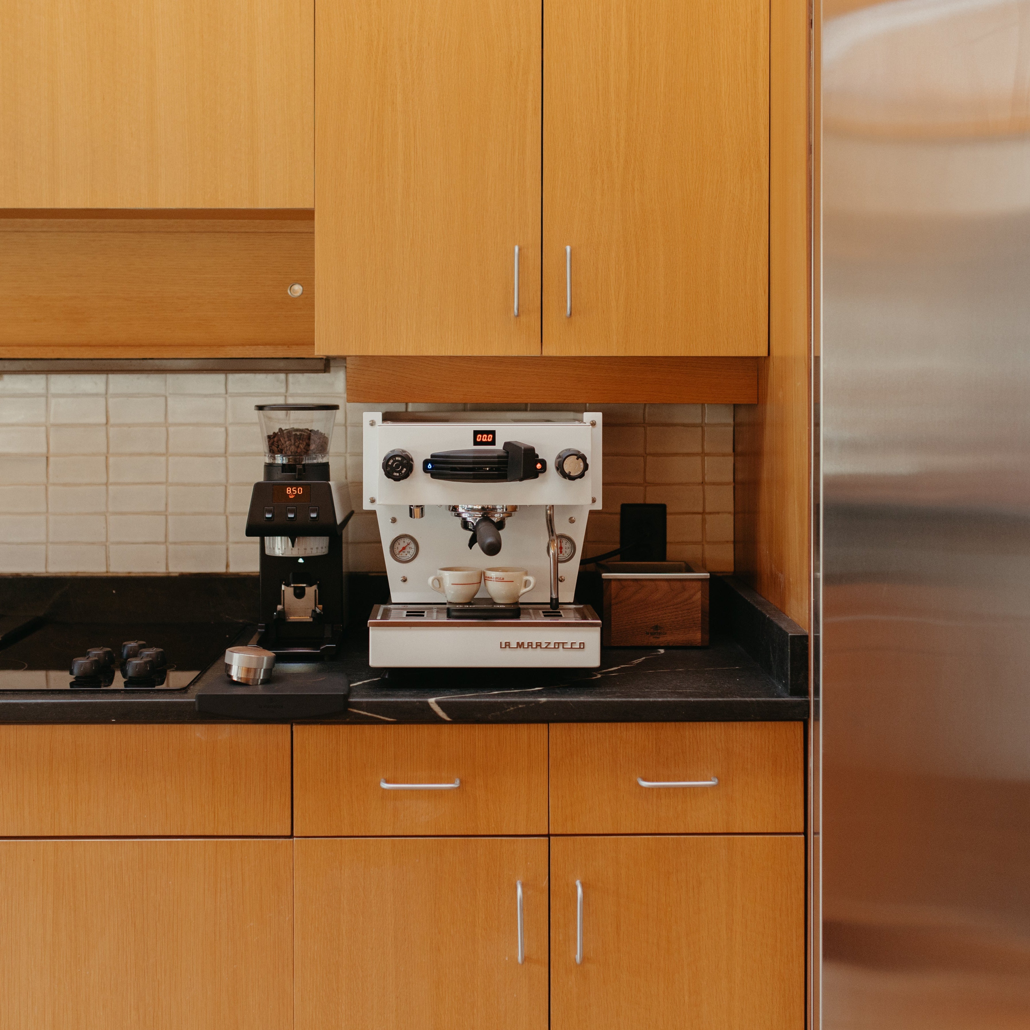 La Marzocco Linea Mini Espresso Machine. Front view of the machine in white.
