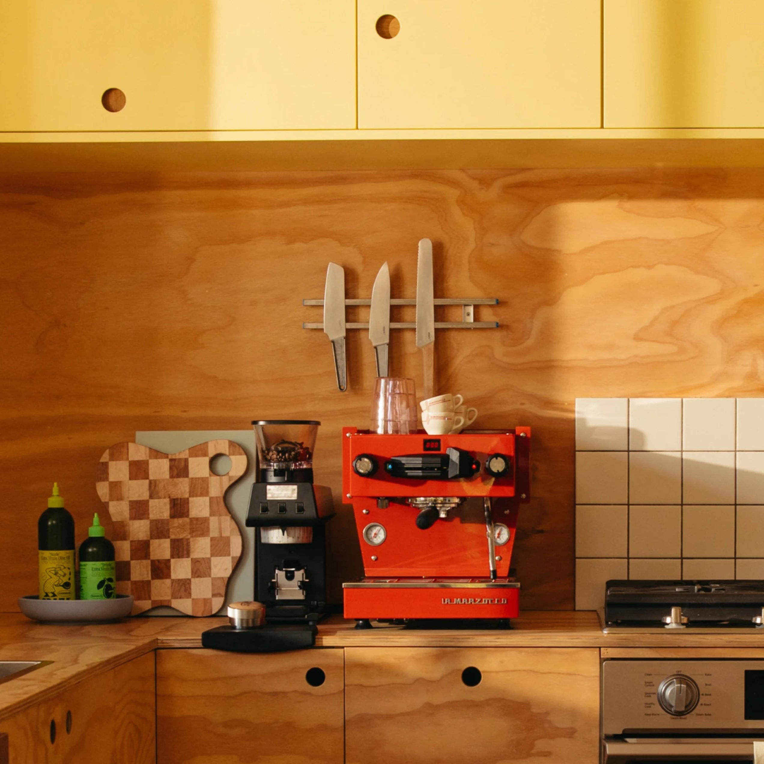 La Marzocco Linea Mini Espresso Machine. Front view of the machine in red.