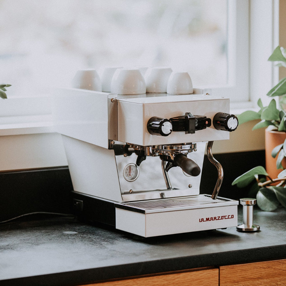 La Marzocco Linea Micra Espresso Machine in white. Front view of the machine.