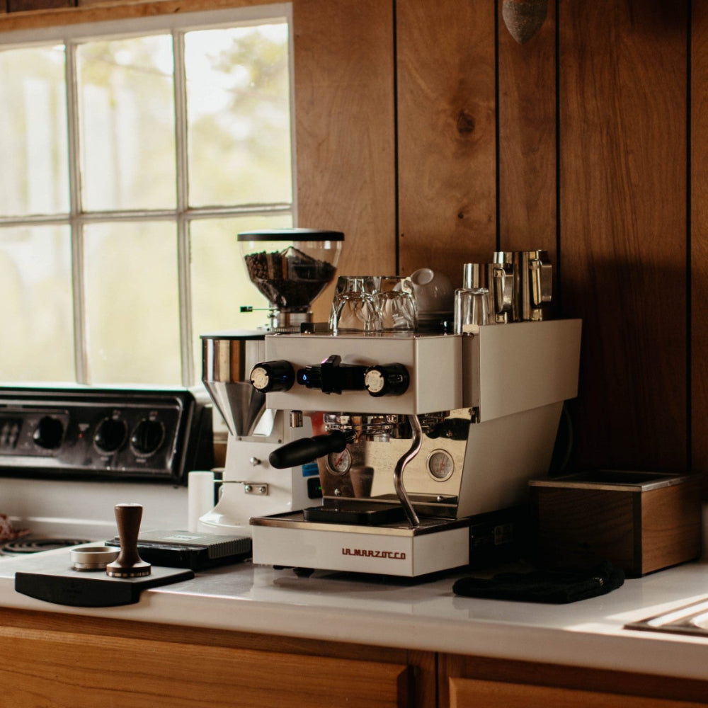 La Marzocco Linea Micra Espresso Machine in white. Front view of the machine.