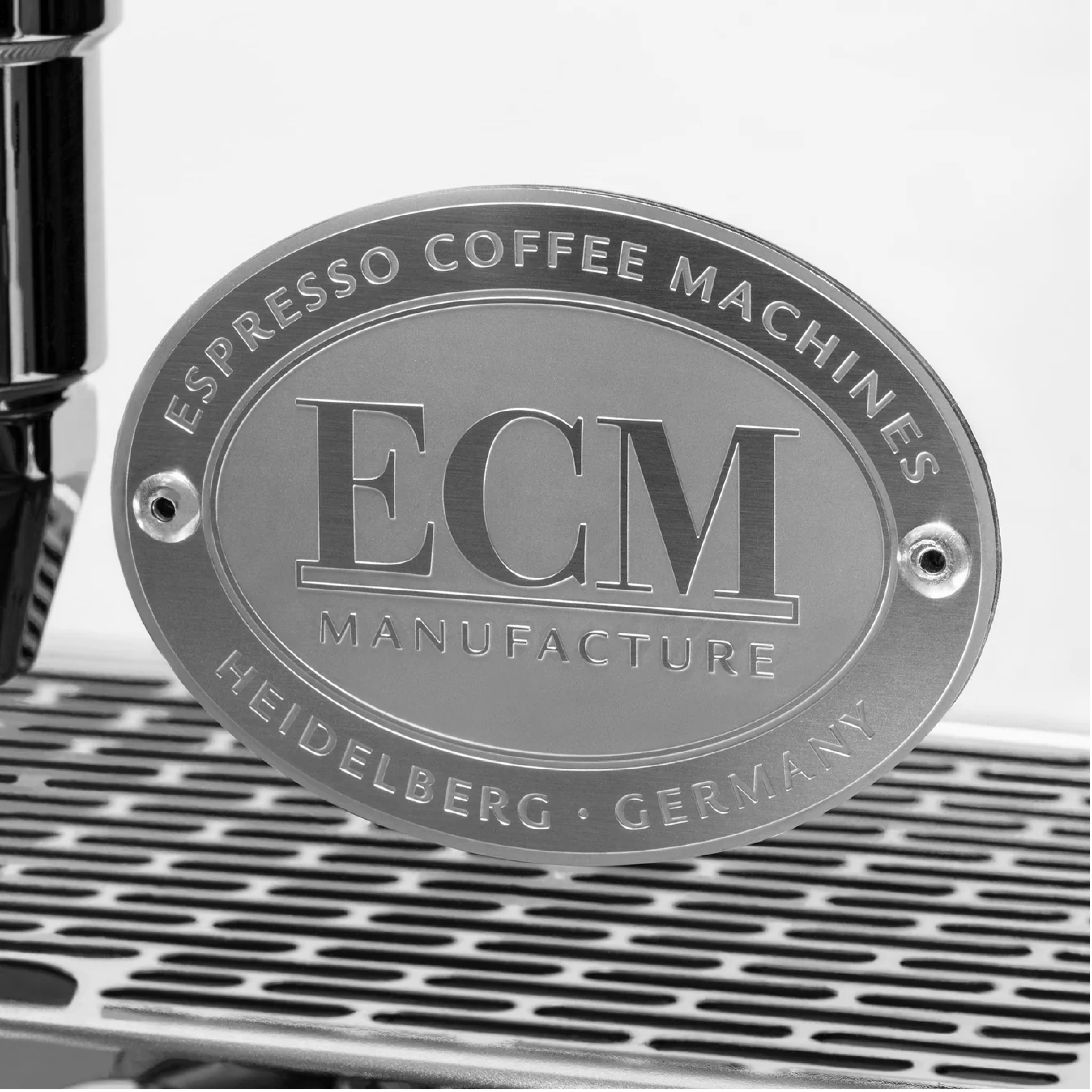 ECM Mechanika MAX Espresso Machine. Close-up of the logo.