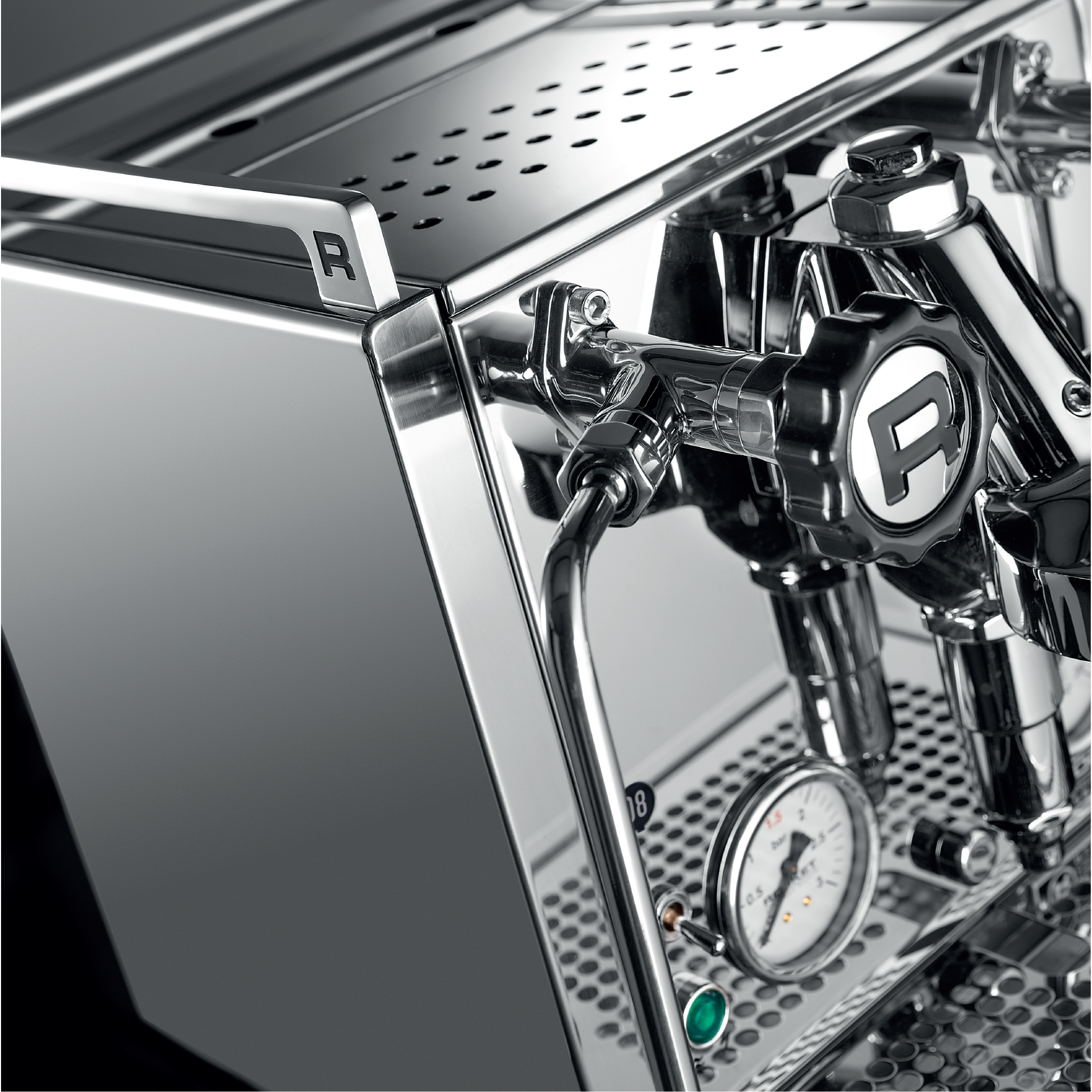 Rocket R Cinquantotto (R58) Espresso Machine. Close up of the cup warming tray, steam knob and pressure gauge.
