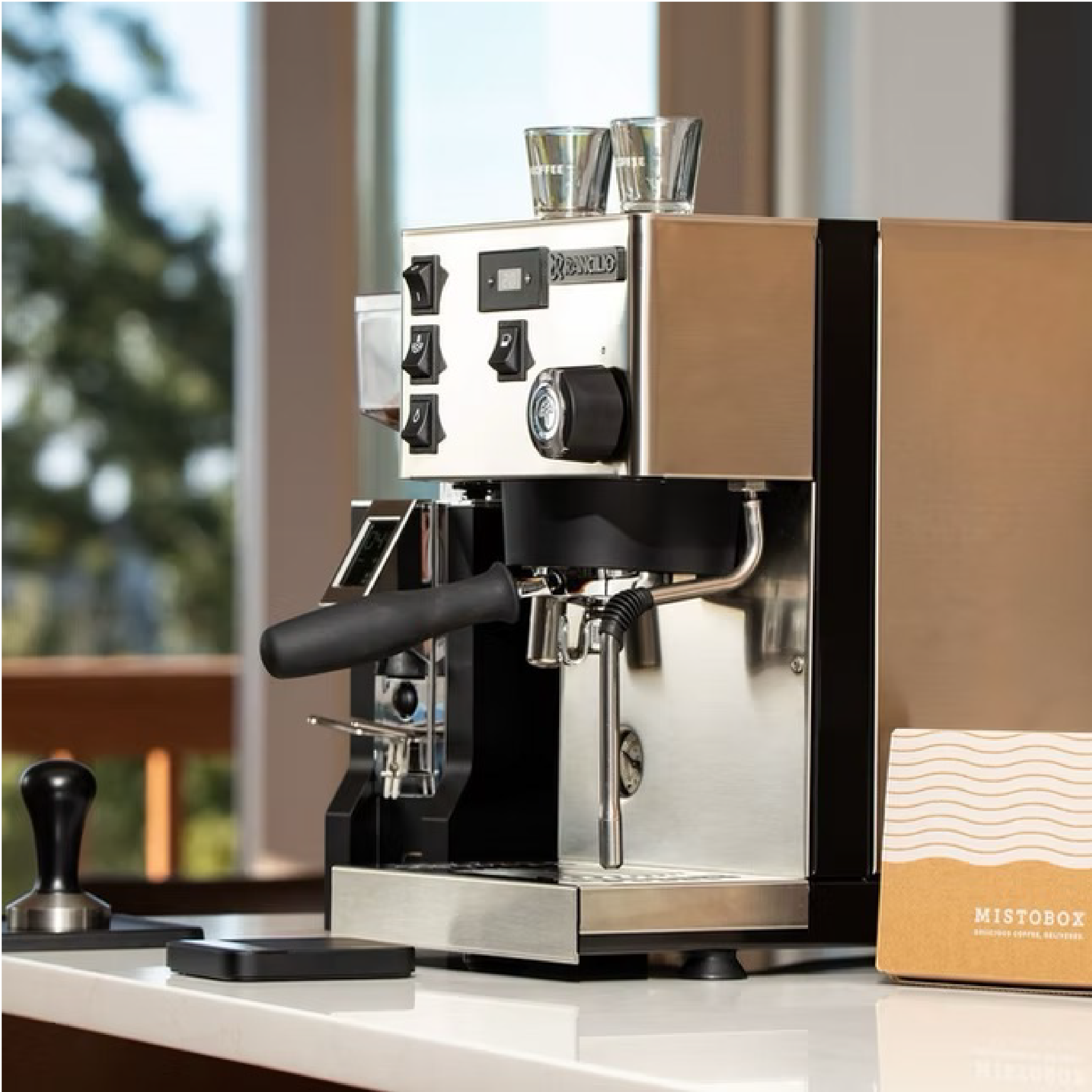 Rancilio Silvia Pro X Espresso Machine in stainless steel. Side view of the machine on countertop.