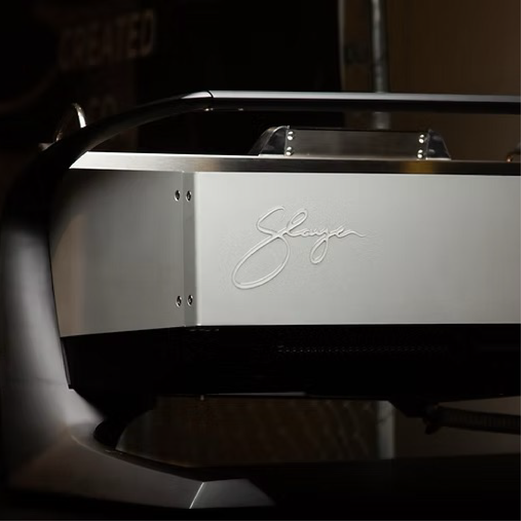 Slayer Steam EP Commercial Espresso Machine. Close up back view of the brand name.