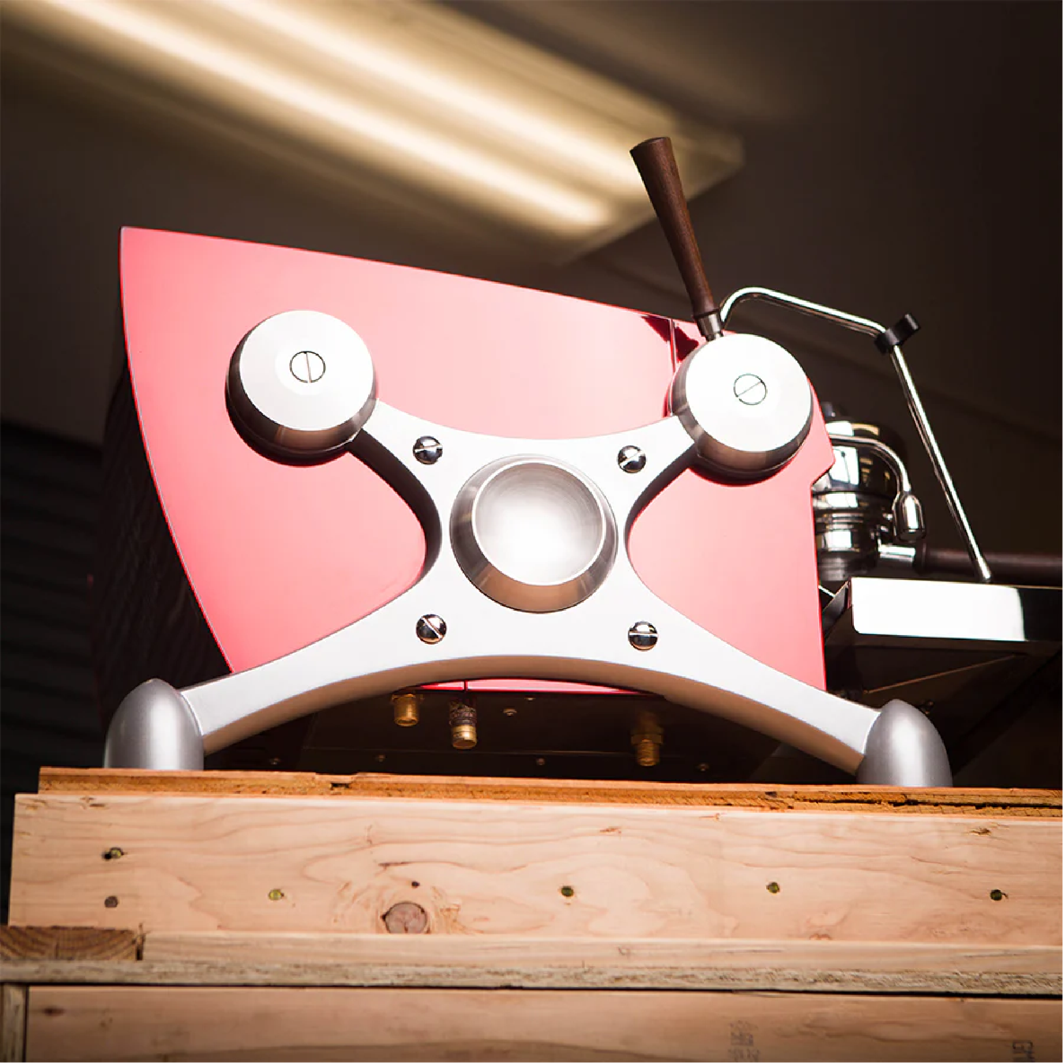 Slayer Espresso Single Group Espresso Machine with crimson red side panel. Side view of the machine.