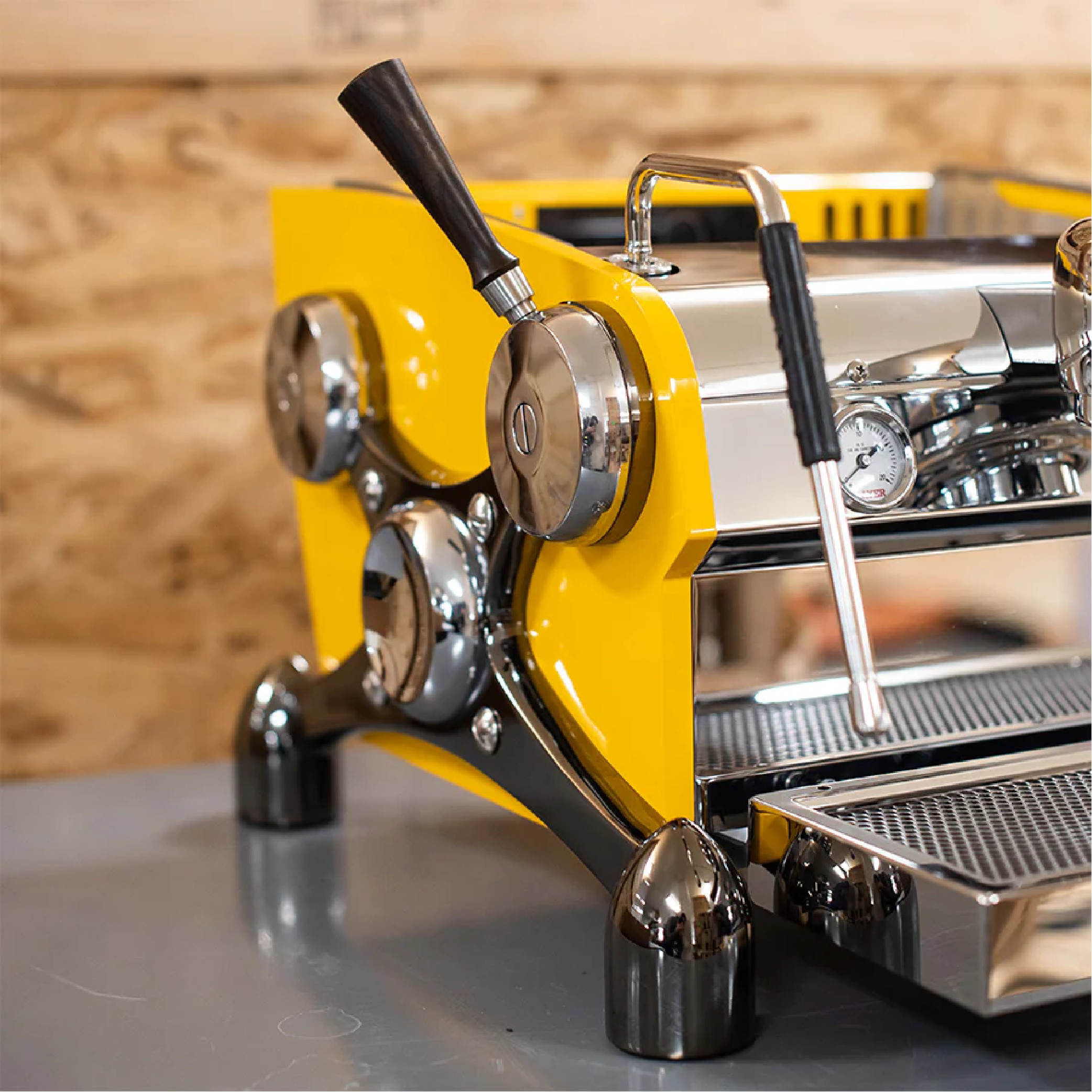 Slayer Espresso Single Group Espresso Machine with goldenrod yellow side panel. Close up of the machine.