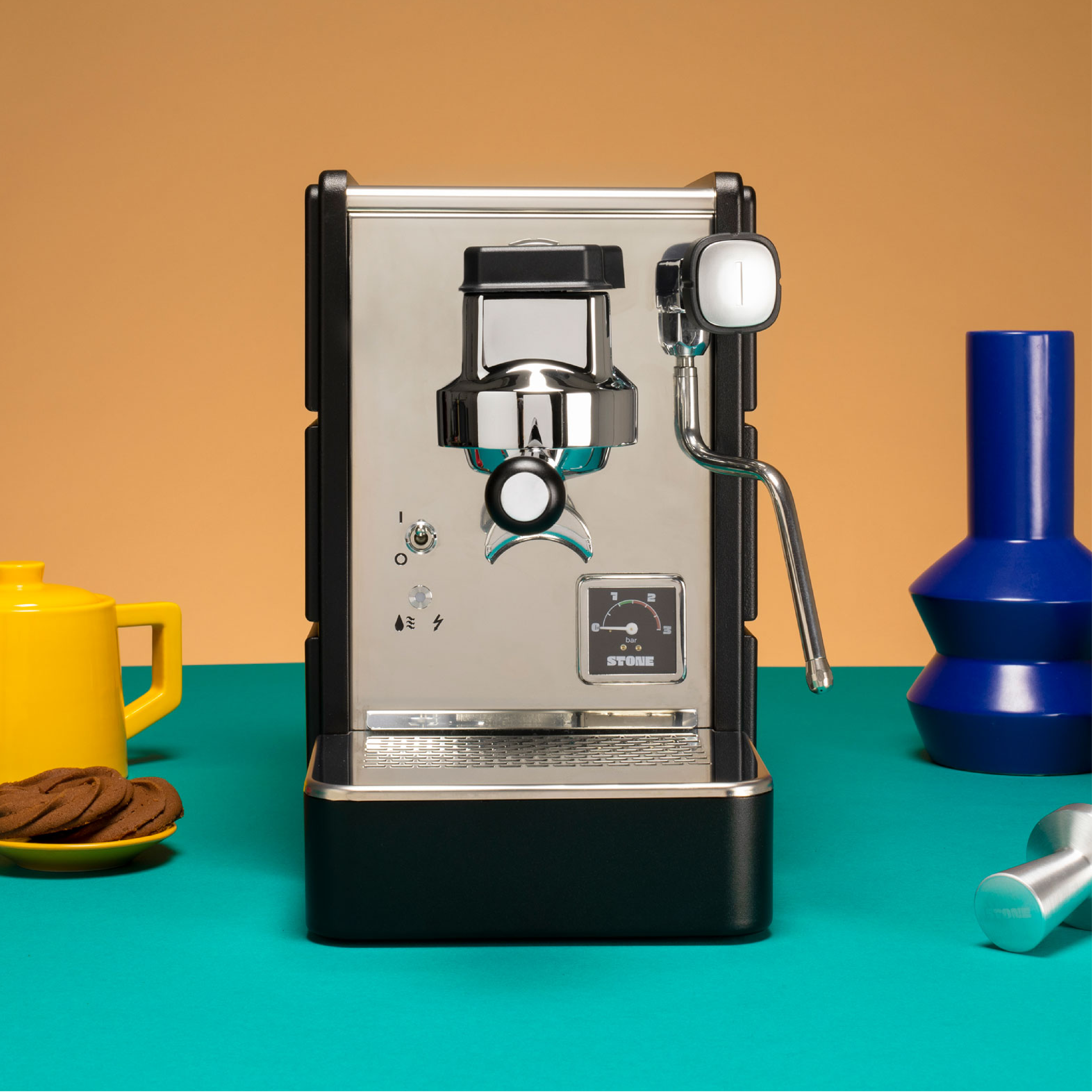 Stone Espresso Machine in plus black. Front view of the machine.