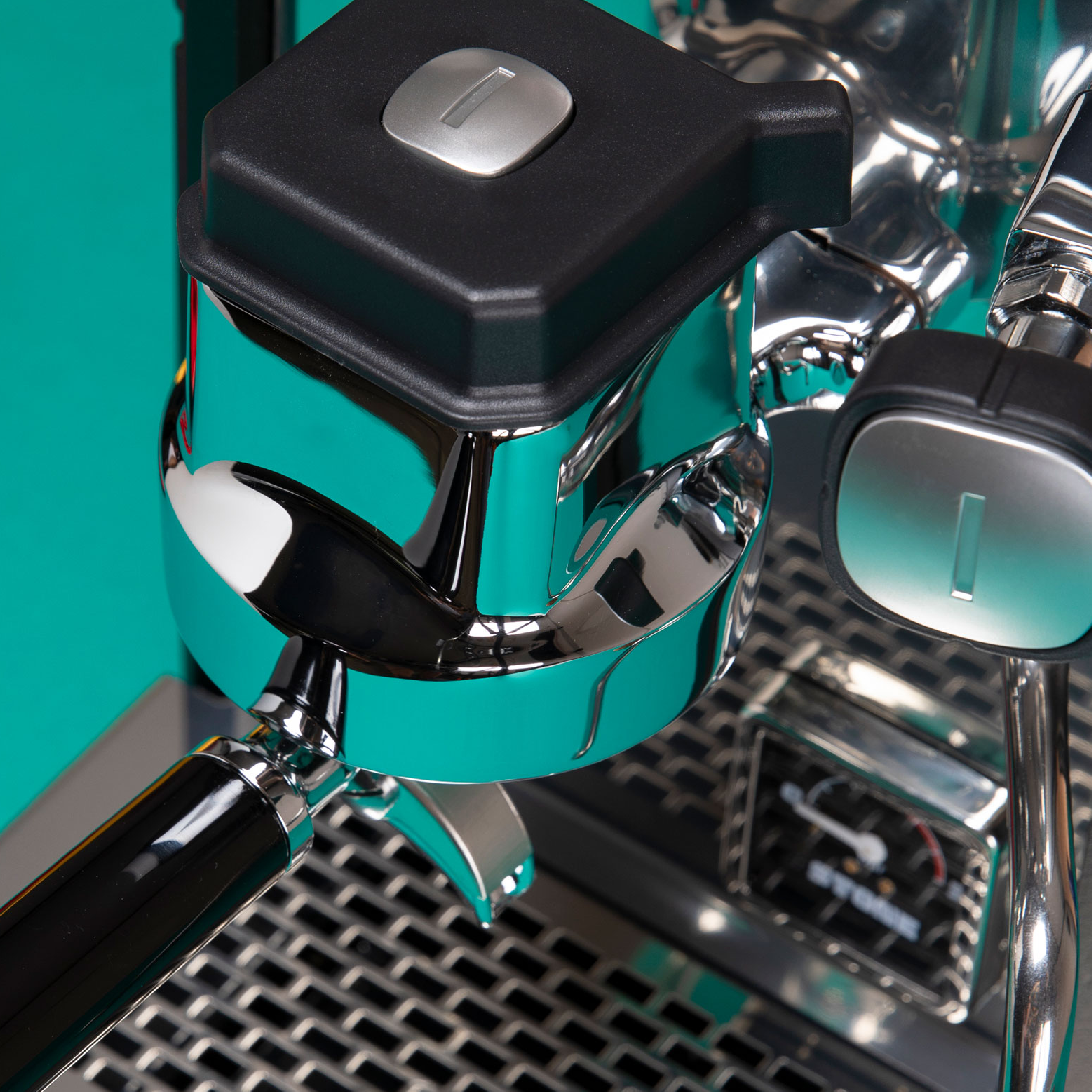 Stone Espresso Machine in plus black. Close up top view of the grouphead.