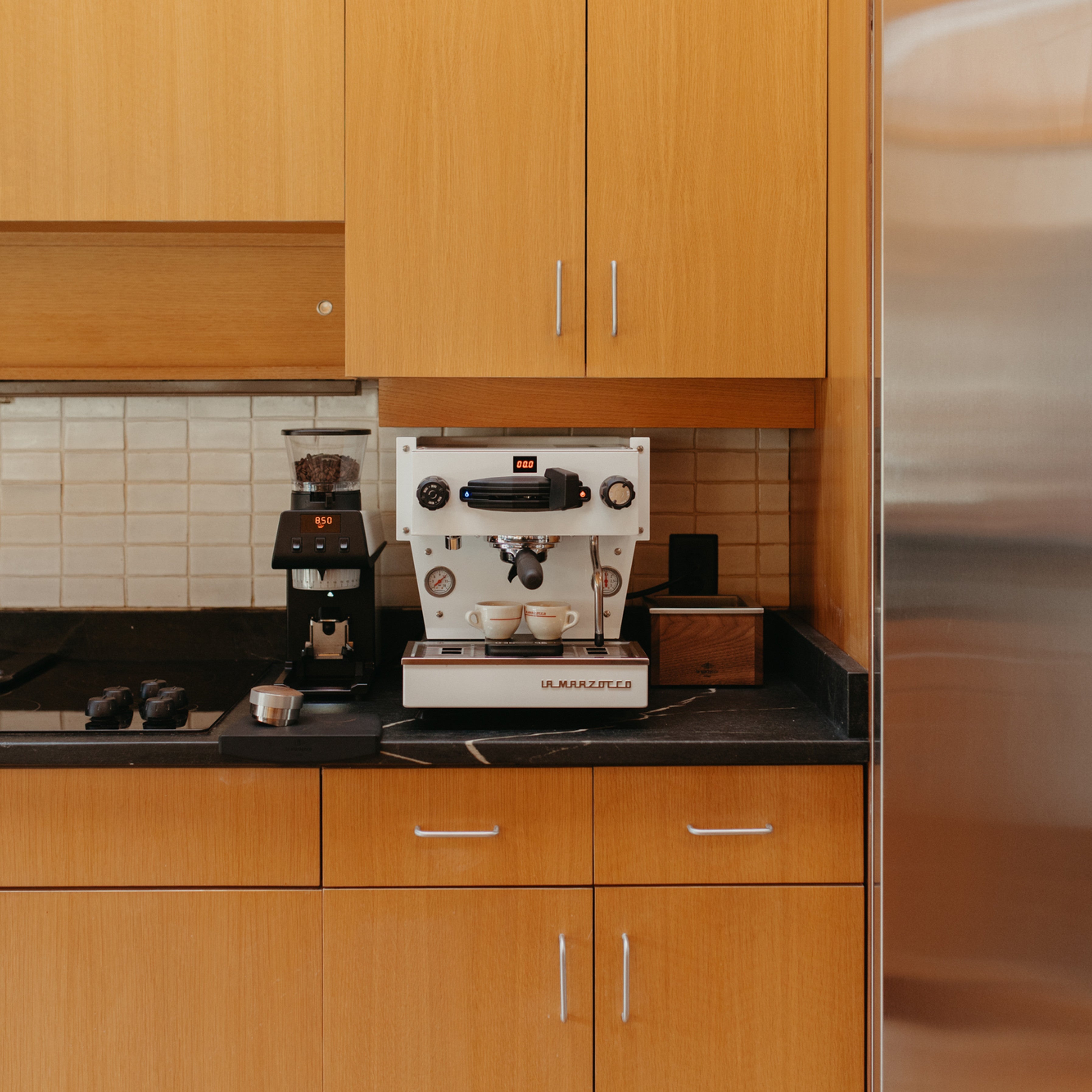 La Marzocco Linea Mini Espresso Machine. Front view of the machine in white.